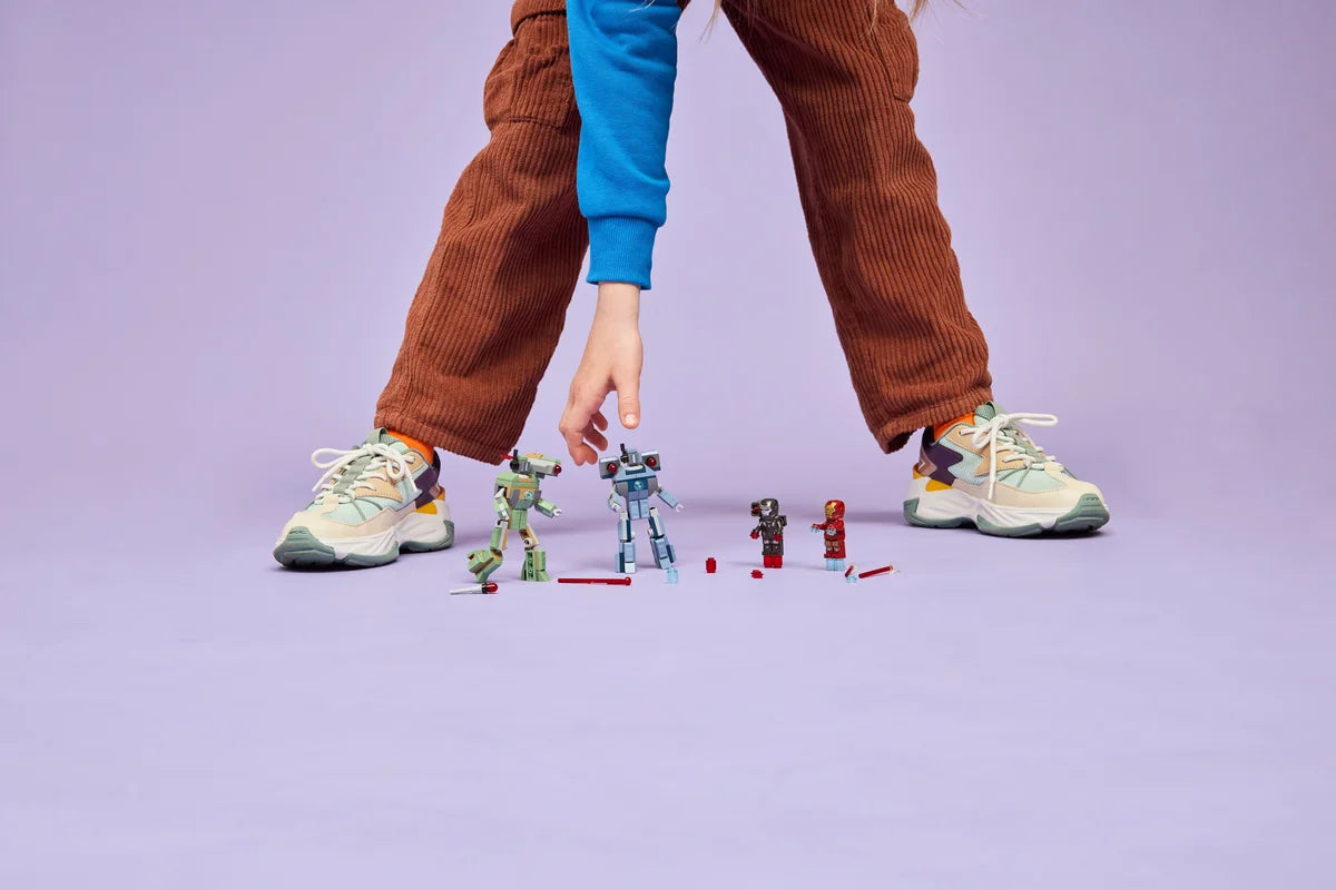 Iron Man y Máquina de Guerra vs. Drones de Hammer